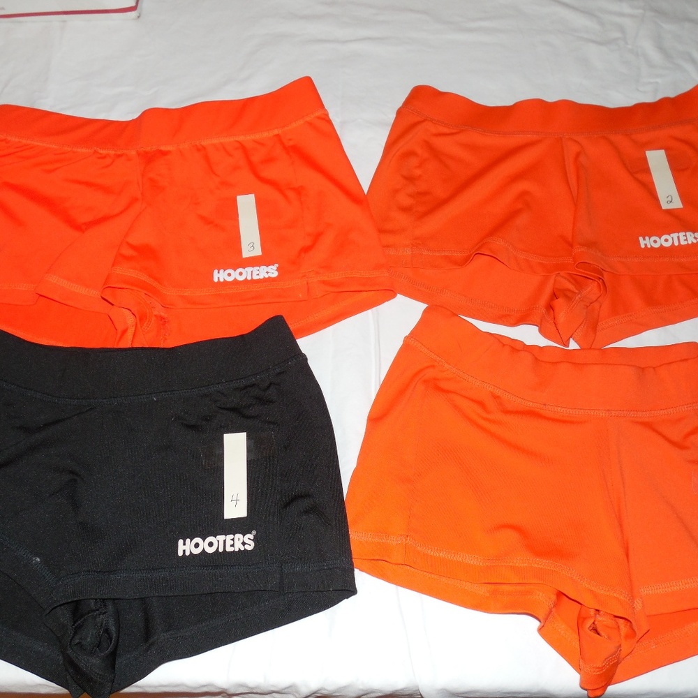 HOOTERS GIRL WORN UNIFORM SHORTS ORGE/BLACK XS/SM - Picture 2 of 4